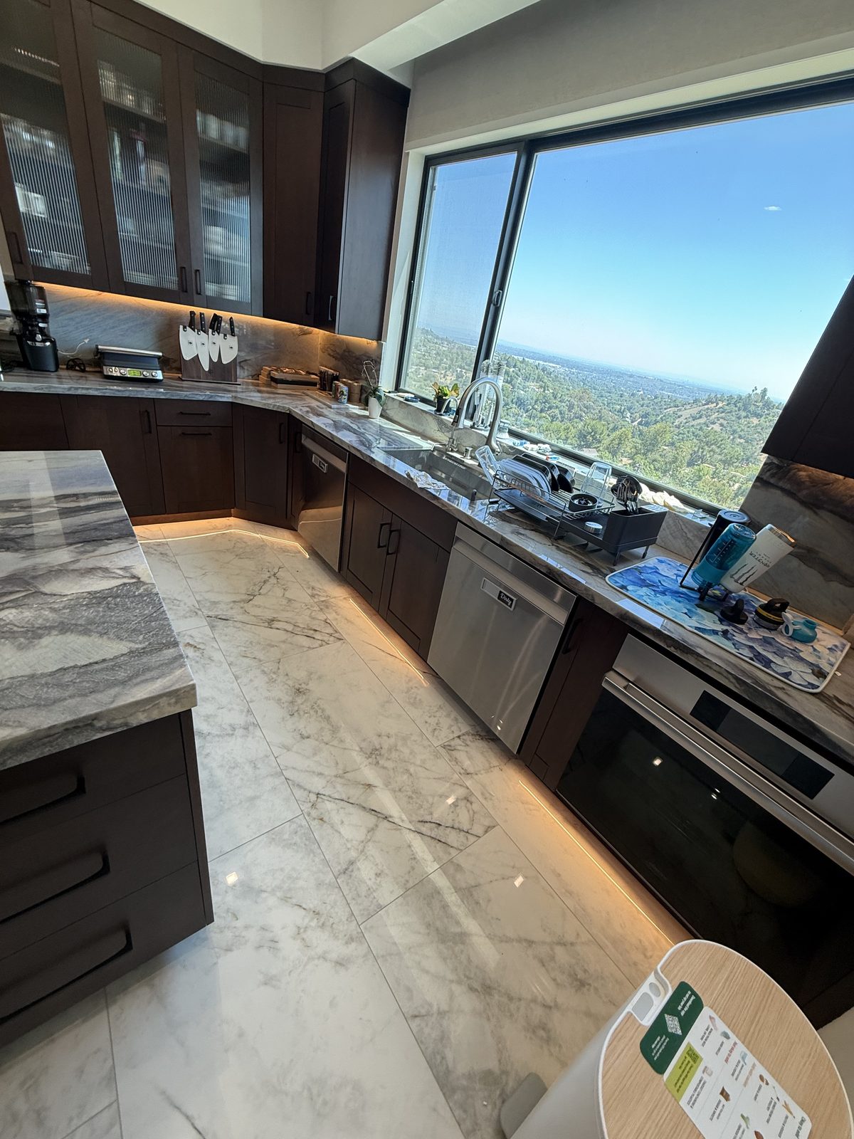 Under-cabinet lighting — luxury ocean view kitchen